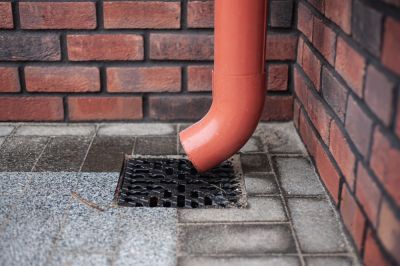 Preserve the Longevity of Your Gutter System with Downspout Repair!
